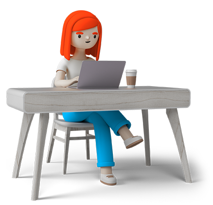 Woman sitting at a desk with a laptop
